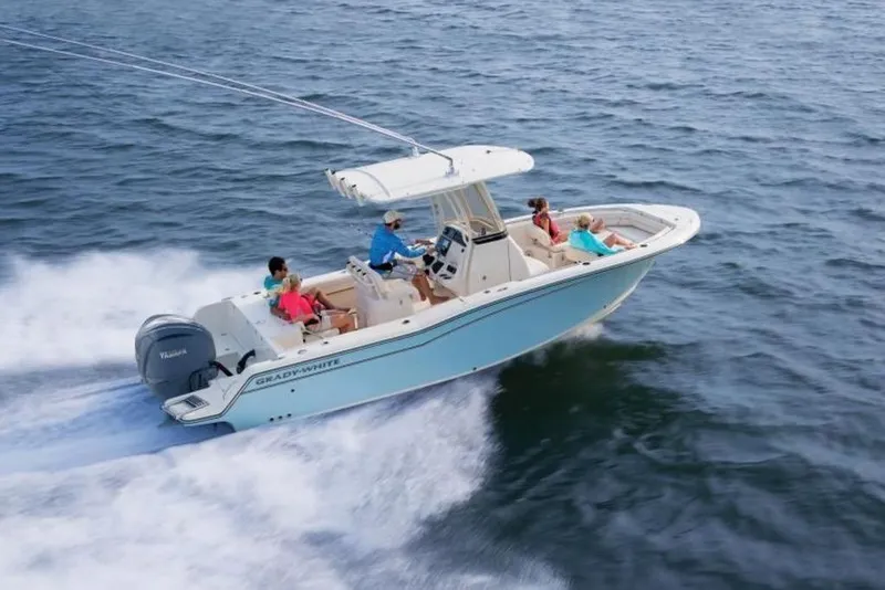 The Image of 2026 Grady-White Fisherman 236 boat cruising on open water with passengers. - 1