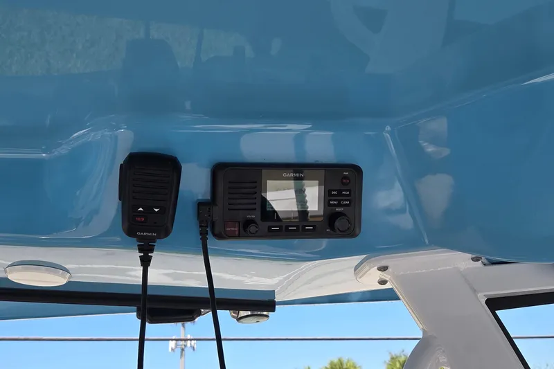 Slide: The Image of 2022 Sportsman Open 282TE Center Console with Garmin marine radio setup. - 22