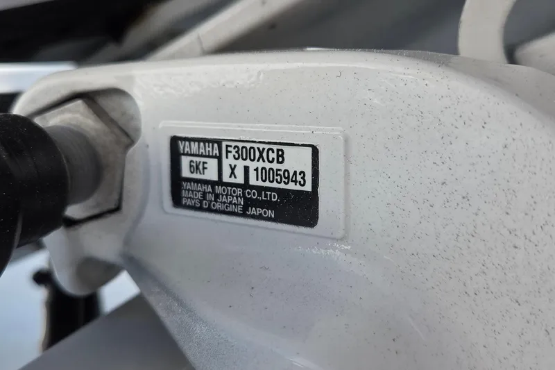 Slide: The Image of Yamaha F300XCB engine label on 2022 Sportsman Open 282TE Center Console. - 27