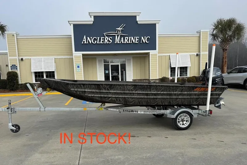 Slide: The Image of 2026 Alweld 1548VV Marsh boat on trailer at Anglers Marine NC, in stock. - 0