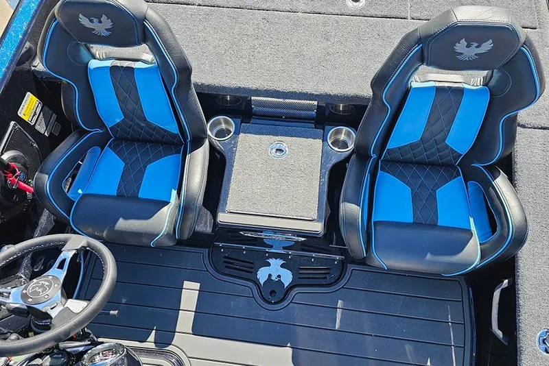 Slide: The Image of 2026 Phoenix 920 Elite X boat interior with blue and black seats. - 18