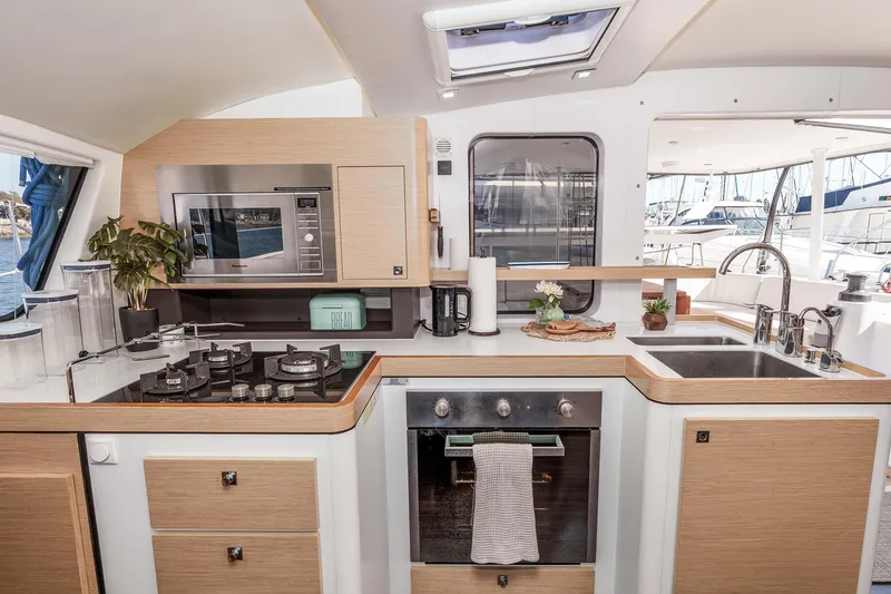 Slide: The Image of Modern kitchen interior of 2014 Outremer 51 yacht with stove, oven, and sink. - 21