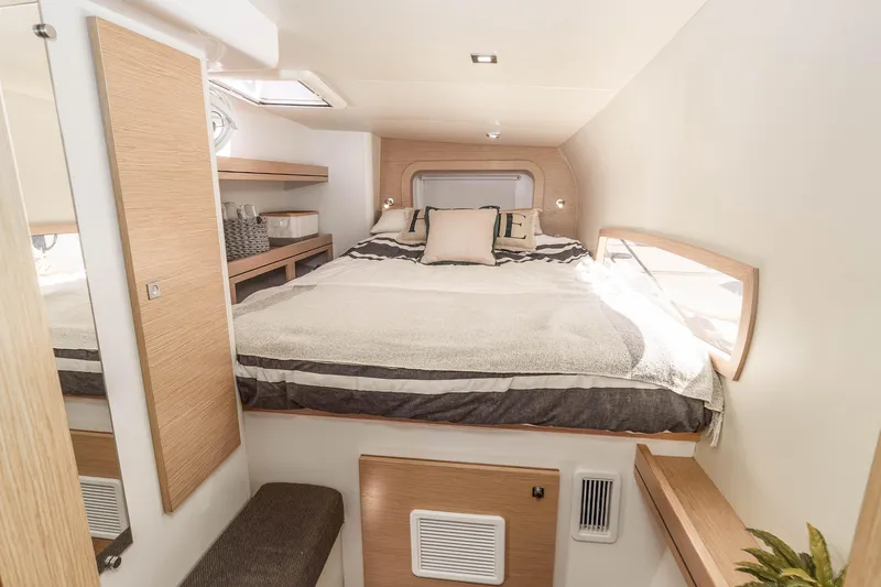 Slide: The Image of Luxurious cabin interior of 2014 Outremer 51 yacht with cozy bed and modern design. - 25