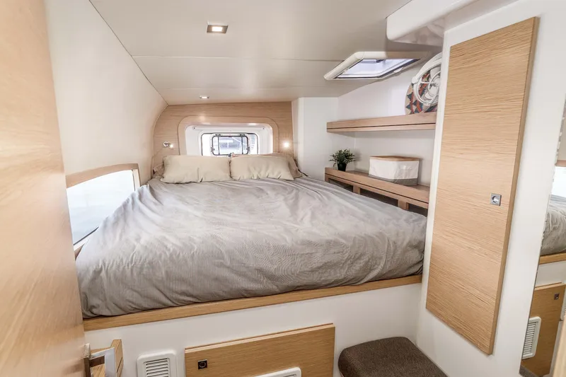 Slide: The Image of Luxurious cabin interior of 2014 Outremer 51 yacht with cozy bed and modern design. - 30