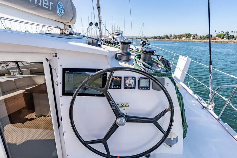 Slide: The Image of 2014 Outremer 51 yacht helm with navigation instruments and ocean view. - 9