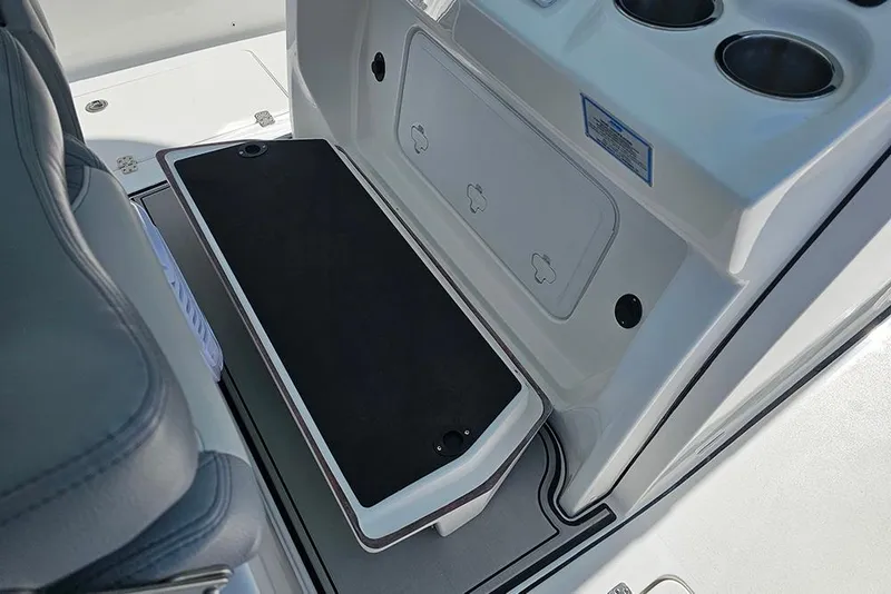 Slide: The Image of 2026 Sea Pro 322 Offshore boat interior with seating and storage compartments. - 32