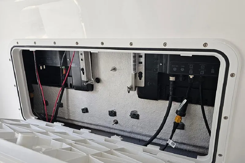 Slide: The Image of Electrical panel inside 2026 Sea Pro 322 Offshore boat, showcasing wiring and connections. - 41