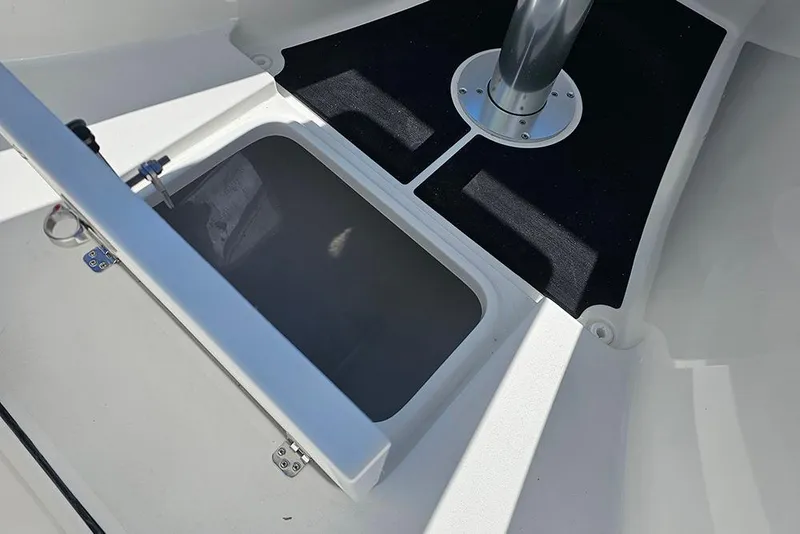 Slide: The Image of 2026 Sea Pro 322 Offshore boat interior with open storage compartment. - 46
