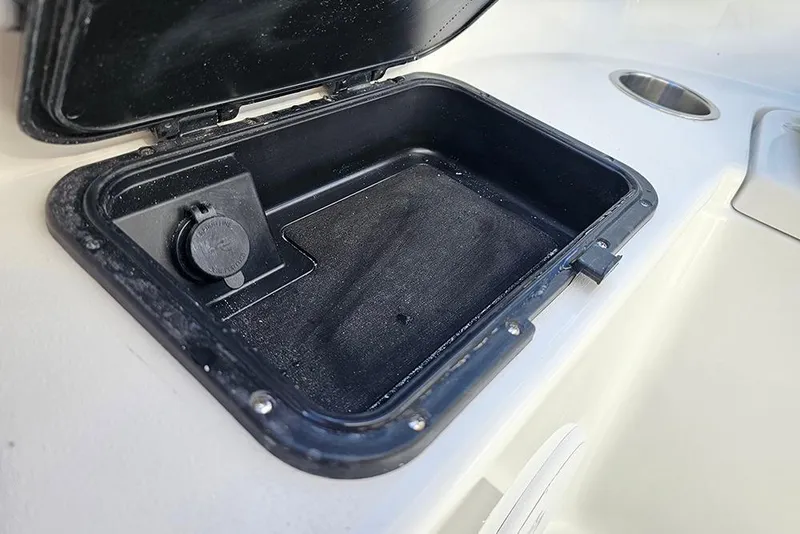 Slide: The Image of Open storage compartment on 2026 Sea Pro 322 Offshore boat deck. - 51