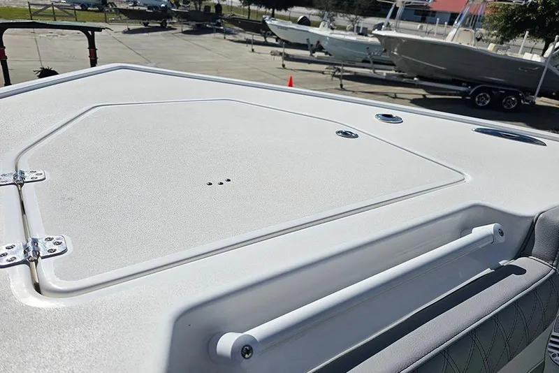 Slide: The Image of 2026 Sea Pro 322 Offshore boat deck with storage hatch and railing. - 52