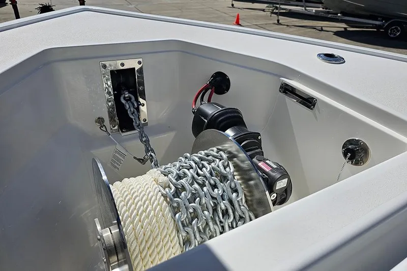 Slide: The Image of 2026 Sea Pro 322 Offshore boat anchor system with chain and rope in storage compartment. - 53