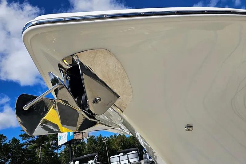 Slide: The Image of 2026 Sea Pro 322 Offshore boat anchor detail against blue sky. - 61