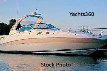 The Image of 2003 Sea Ray 340 Sundancer yacht on calm water at sunset. - 0