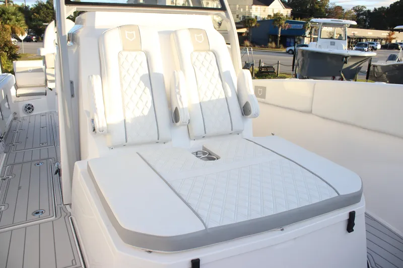 Slide: The Image of 2026 Sea Fox 328 Commander boat with luxurious white seating and modern design. - 16