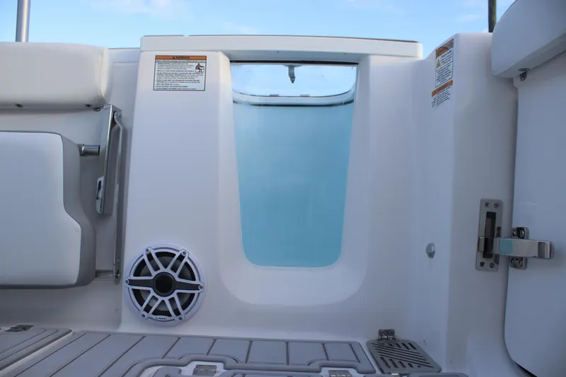 Slide: The Image of 2026 Sea Fox 328 Commander interior, featuring seating and speaker details. - 17