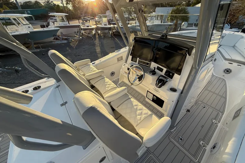 Slide: The Image of 2026 Sea Fox 328 Commander boat interior with modern helm and seating. - 24