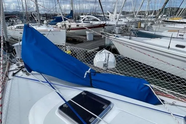 Slide: The Image of Close-up of a 2003 Sabre 426 boat hull with a metal fitting. - 12