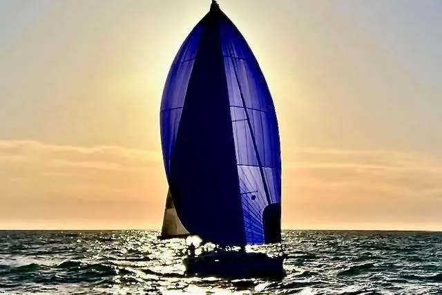 Slide: The Image of Sailing yacht Sabre 426, 2003 model, cruising on a sunny day with blue skies. - 8