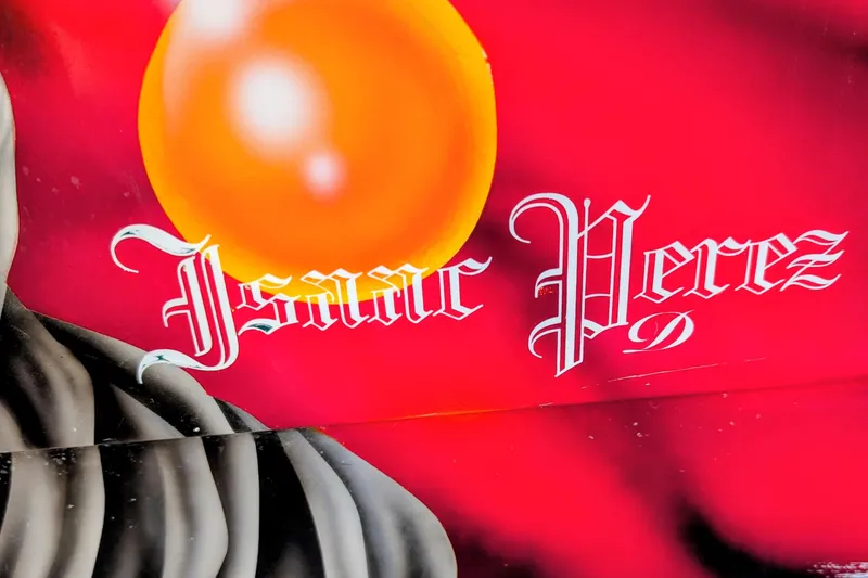 Slide: The Image of Red and black design with stylized text on Advantage Poker Run 40 boat, 2000 model. - 15