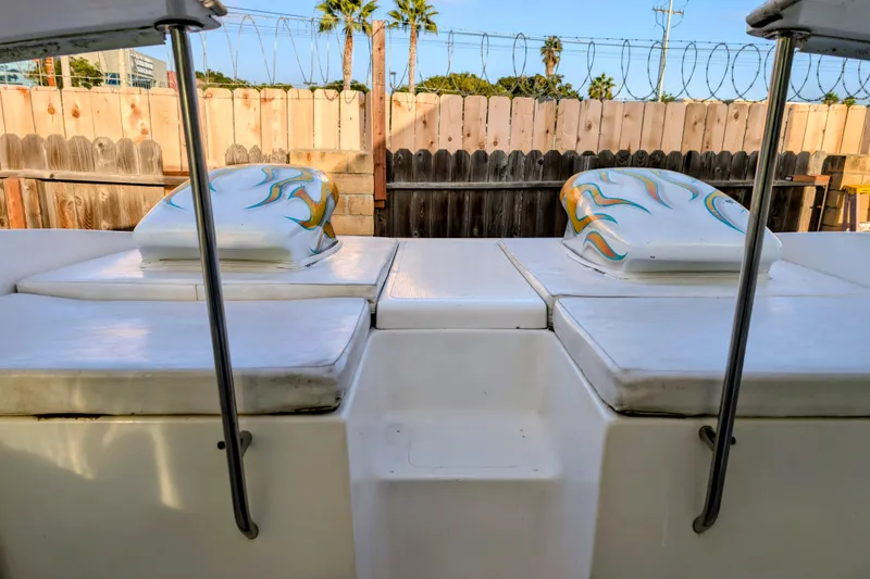 Slide: The Image of 2000 Advantage Poker Run 40 boat interior with custom engine covers and seating. - 22