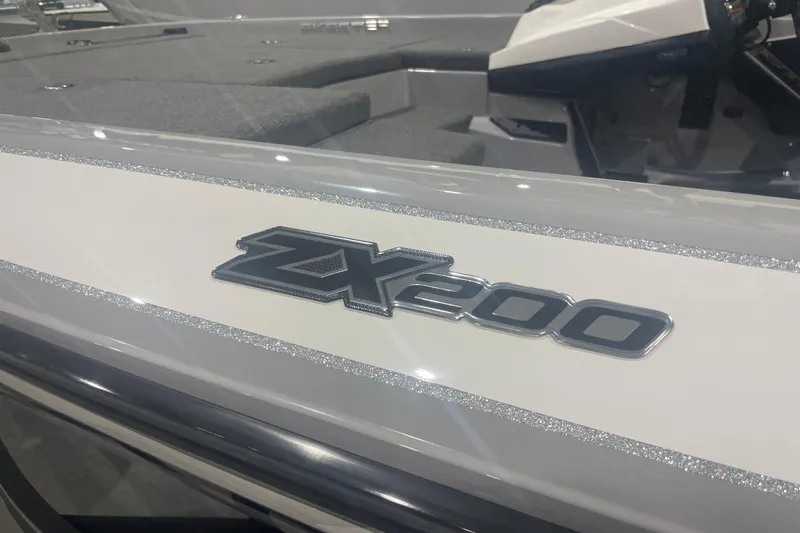Slide: The Image of 2022 Skeeter ZX200 boat interior with model emblem detail. - 2