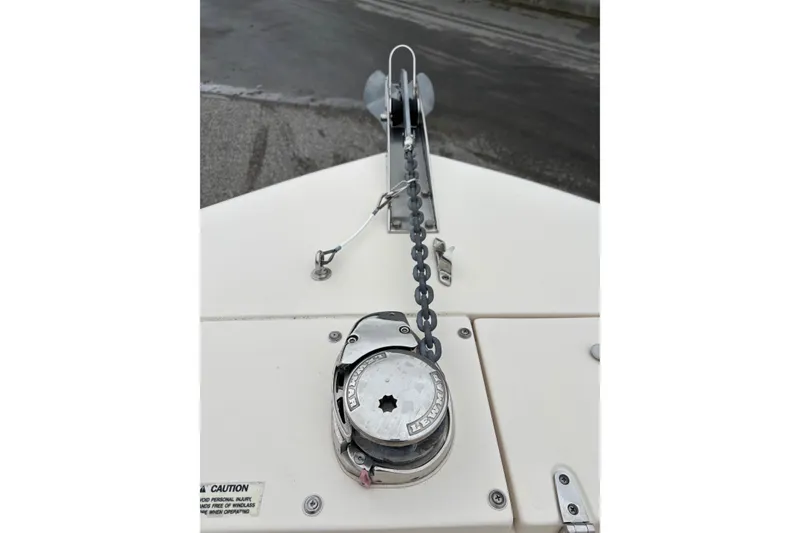 Slide: The Image of 2021 Grady-White Fisherman 257 boat anchor chain and winch detail. - 6