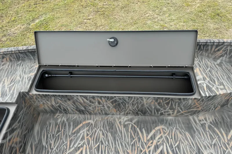 Slide: The Image of 2026 Alweld 1756 Invader boat interior with camo design and spacious deck layout. - 10