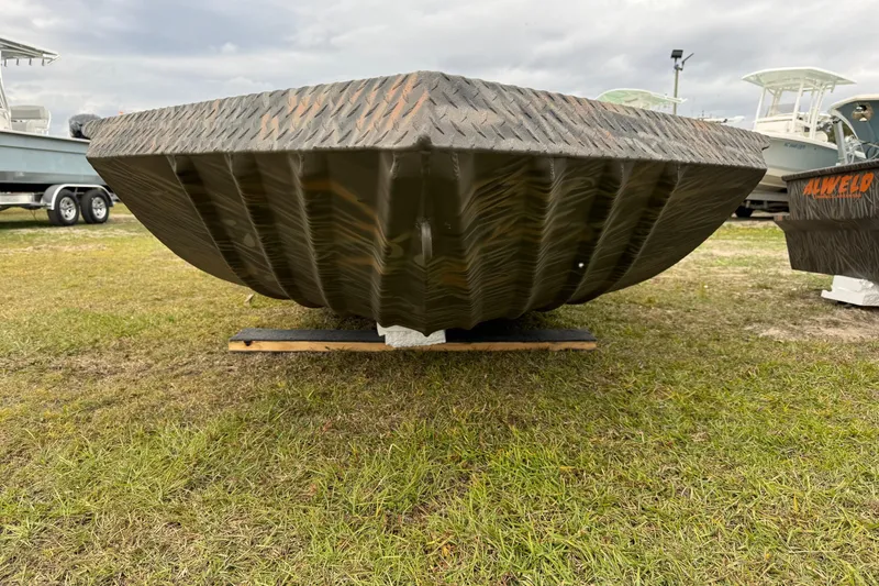 Slide: The Image of 2026 Alweld 1756 Invader boat interior with open storage compartments. - 7