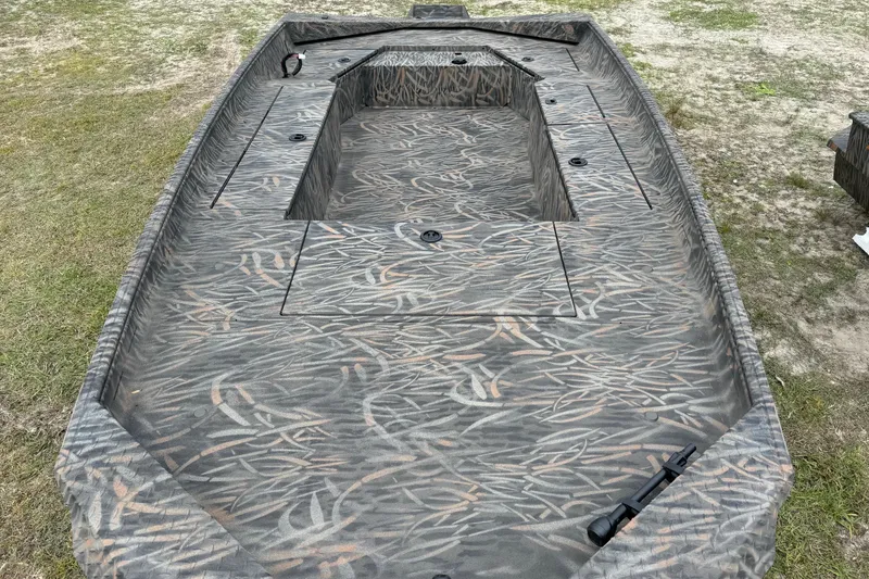 Slide: The Image of 2026 Alweld 1756 Invader boat interior with open storage compartments. - 6