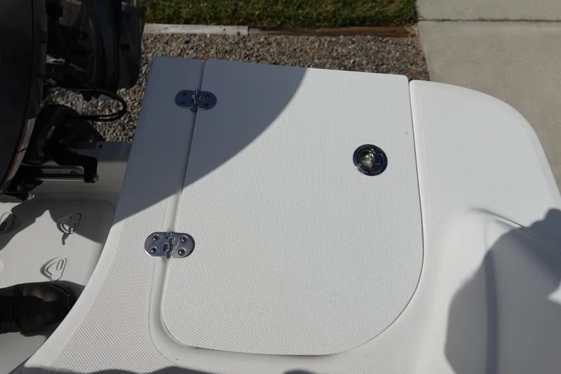 Slide: The Image of 2021 Hurricane Sundeck Sport 218 OB boat deck with hatch and hinges. - 16