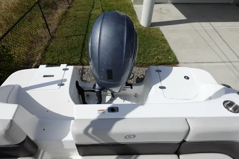 Slide: The Image of 2021 Hurricane Sundeck Sport 218 OB boat with outboard motor, rear view. - 20