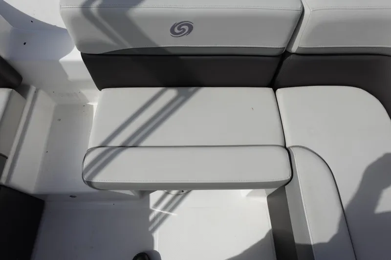 Slide: The Image of 2021 Hurricane Sundeck Sport 218 OB boat seating, featuring gray and black cushioned design. - 25