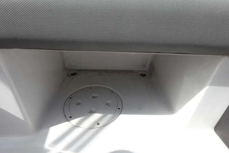 Slide: The Image of 2021 Hurricane Sundeck Sport 218 OB boat storage compartment detail. - 26