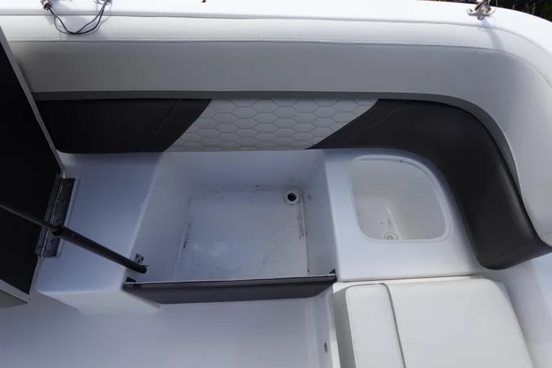 Slide: The Image of 2021 Hurricane Sundeck Sport 218 OB boat interior storage compartment. - 30
