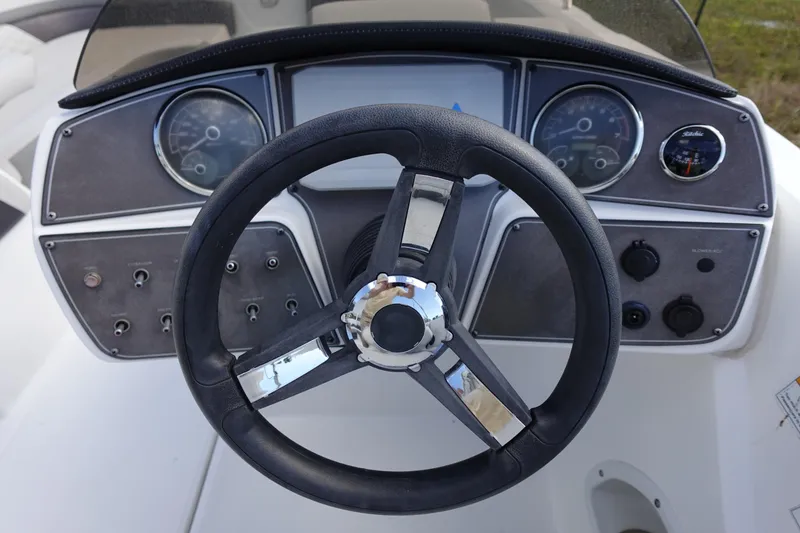 Slide: The Image of Steering wheel and dashboard of 2021 Hurricane Sundeck Sport 218 OB boat. - 33