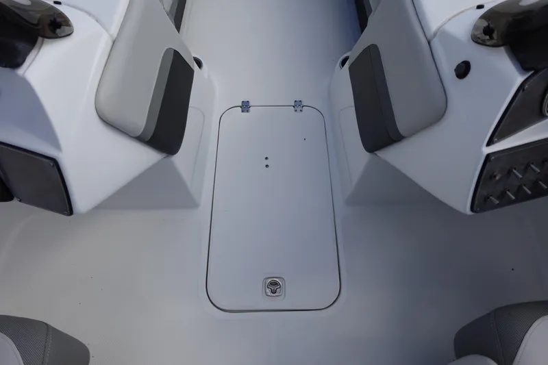 Slide: The Image of 2021 Hurricane Sundeck Sport 218 OB interior seating and storage area. - 36