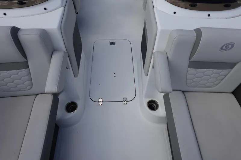 Slide: The Image of 2021 Hurricane Sundeck Sport 218 OB interior seating with storage compartment. - 38