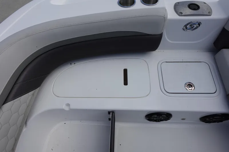 Slide: The Image of 2021 Hurricane Sundeck Sport 218 OB boat interior with seating and storage compartments. - 39