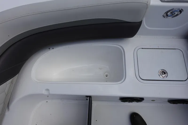Slide: The Image of Interior view of 2021 Hurricane Sundeck Sport 218 OB boat, featuring seating and storage compartments. - 40