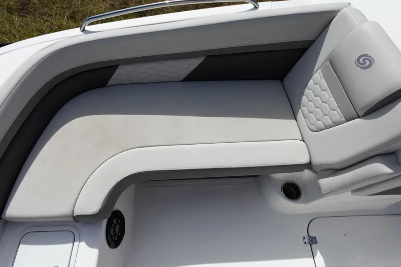 Slide: The Image of 2021 Hurricane Sundeck Sport 218 OB boat seating with gray upholstery and hexagonal pattern. - 46