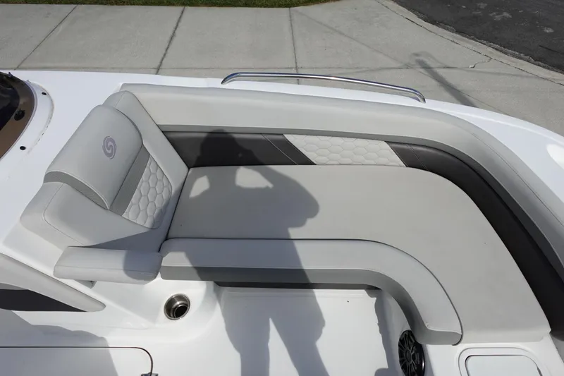 Slide: The Image of 2021 Hurricane Sundeck Sport 218 OB boat seating area with gray upholstery and modern design. - 54