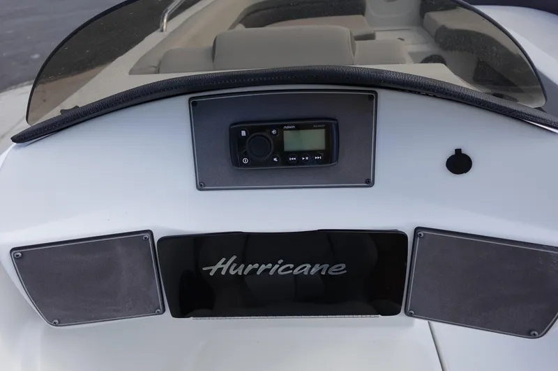 Slide: The Image of Dashboard of 2021 Hurricane Sundeck Sport 218 OB boat with audio controls. - 63
