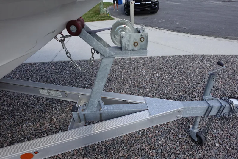 Slide: The Image of Trailer hitch of a 2021 Hurricane Sundeck Sport 218 OB on gravel surface. - 73
