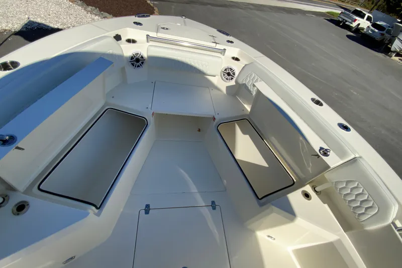 Slide: The Image of 2026 Cobia 265 Center Console boat interior with spacious seating and storage compartments. - 38