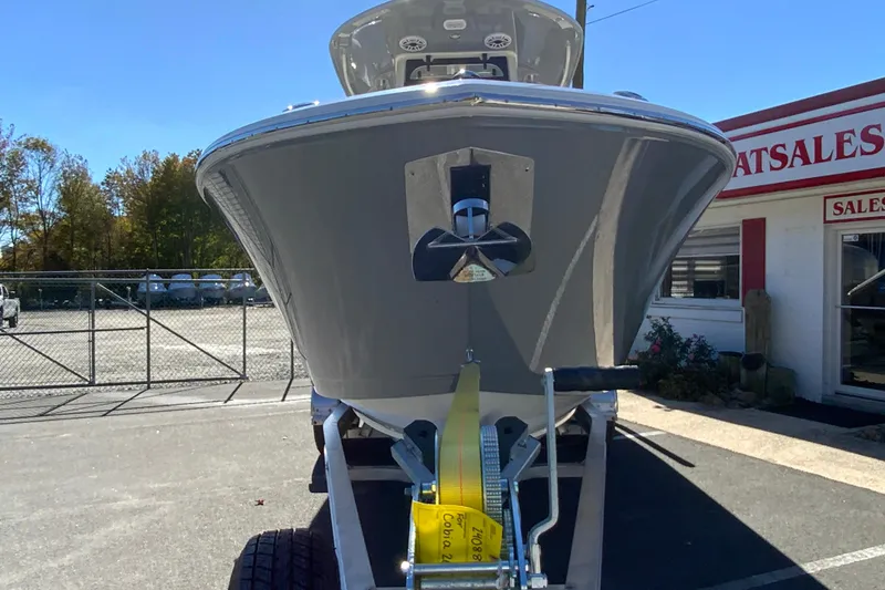 Slide: The Image of 2026 Cobia 265 Center Console boat on trailer at dealership. - 4