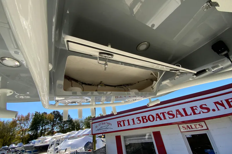 Slide: The Image of 2026 Cobia 265 Center Console boat at RT113 Boat Sales dealership. - 41