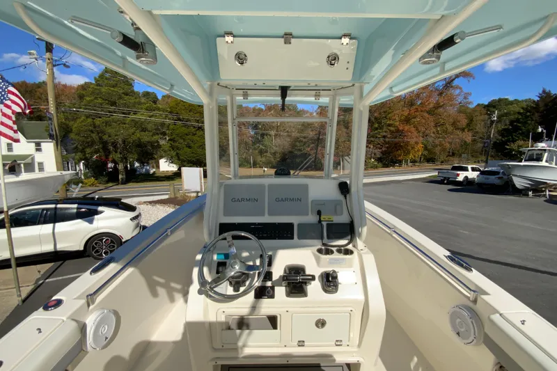 Slide: The Image of 2019 Cobia 262 Center Console boat dashboard with Garmin navigation system. - 11