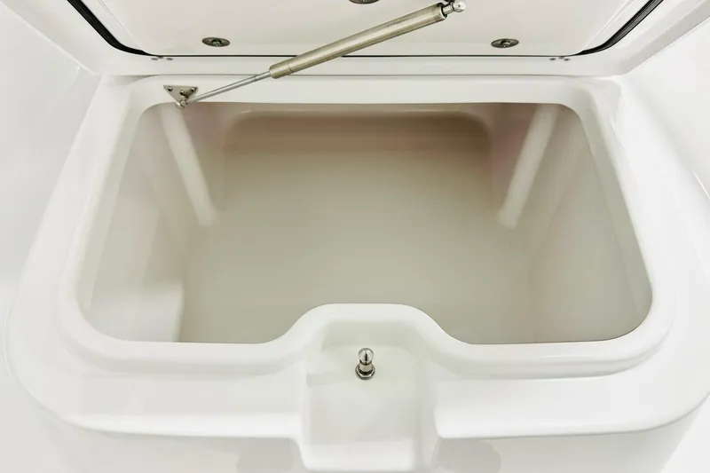 Slide: The Image of Open storage compartment on 2026 Sportsman Masters 247OE Bay Boat. - 11