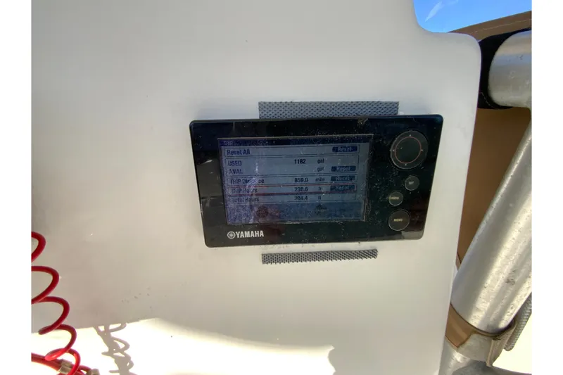Slide: The Image of Yamaha display on 2011 Sea Fox 256 Center Console showing trip data and fuel usage. - 26
