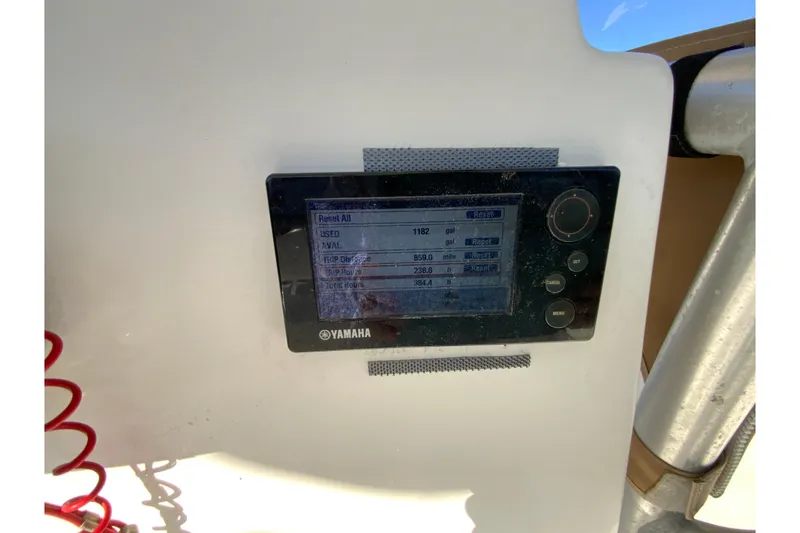 Slide: The Image of Yamaha display on 2011 Sea Fox 256 Center Console boat dashboard, showing trip data. - 27